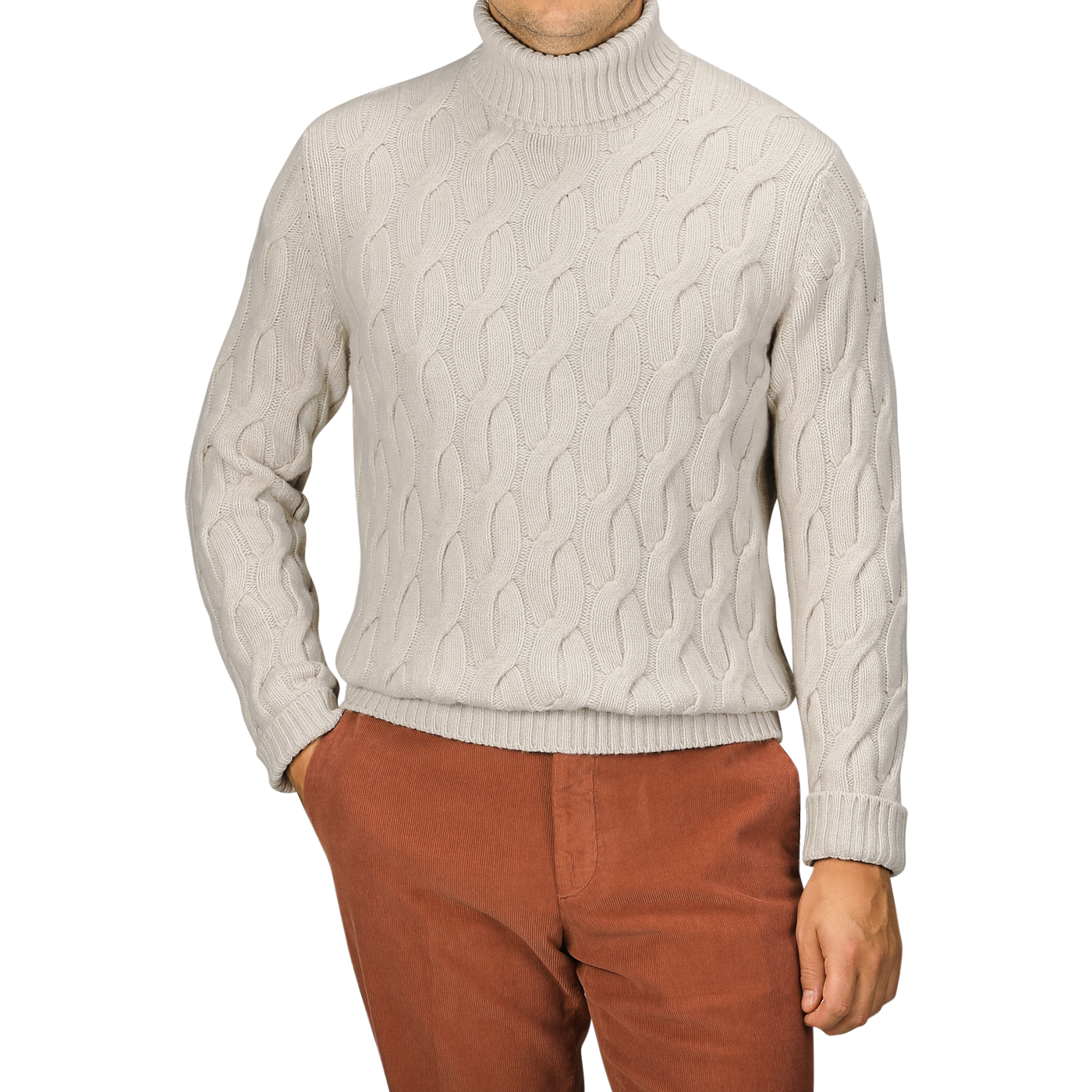 A person wearing an Ecru Beige Wool Cable Knit Rollneck from Zanone and rust-colored pants stands against a plain background. Face is not visible.