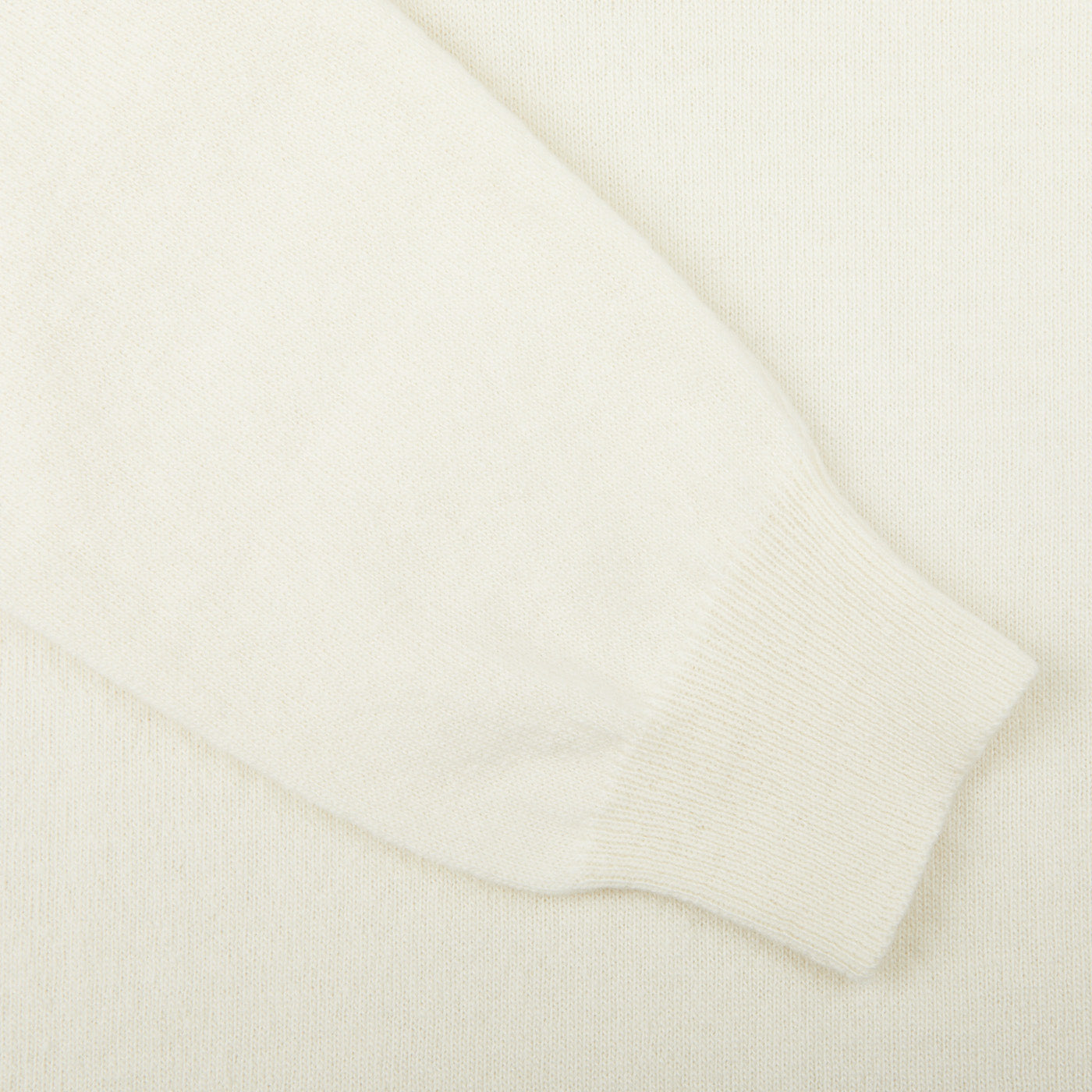 A close-up of a white Zanone Ecru Beige Wool Cashmere Rollneck sweater on a white surface.