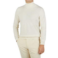 A man in Zanone Ecru Beige Wool Cashmere Rollneck knitwear.