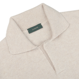 Ecru beige, regular-fit polo shirt with a ribbed collar and a green label that reads "Zanone," crafted from pure virgin wool.