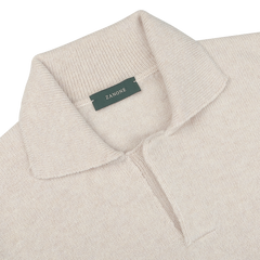 Ecru beige, regular-fit polo shirt with a ribbed collar and a green label that reads "Zanone," crafted from pure virgin wool.