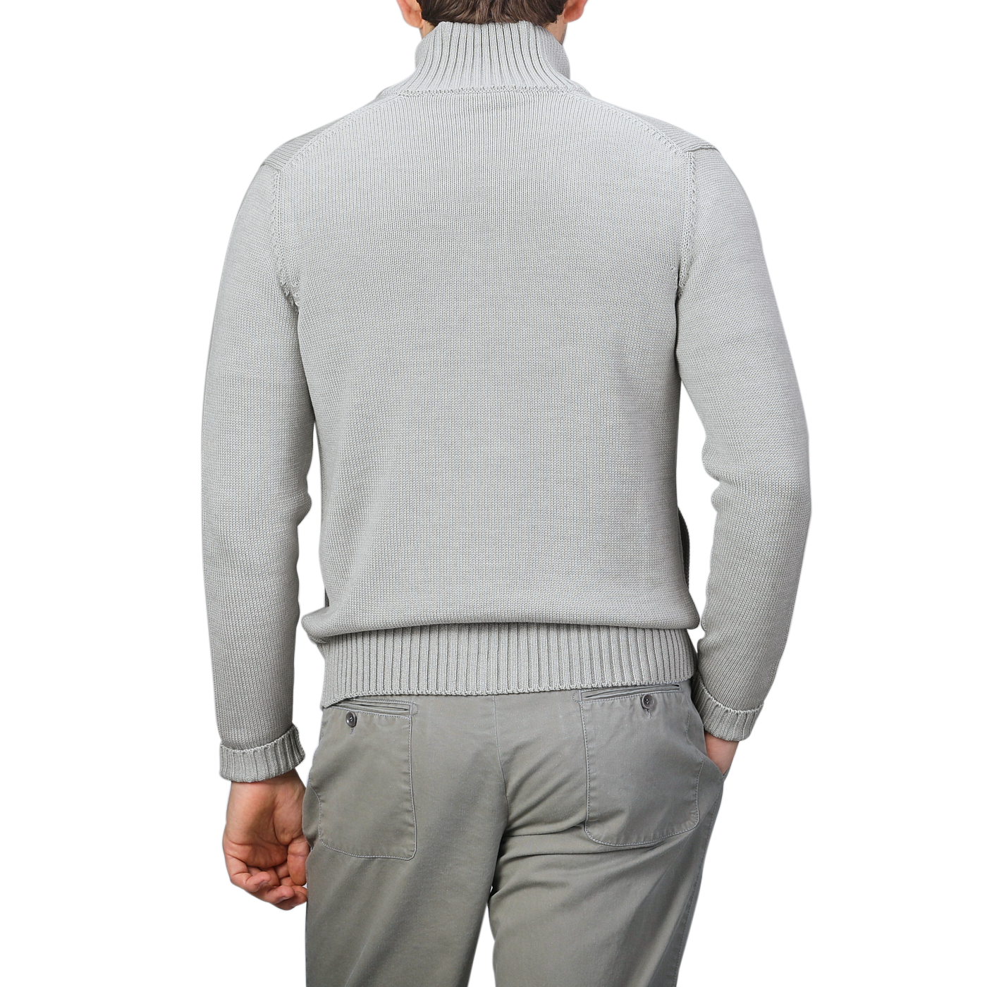 A person wearing a light gray Zanone merino wool button cardigan and gray pants, expertly crafted, viewed from the back.