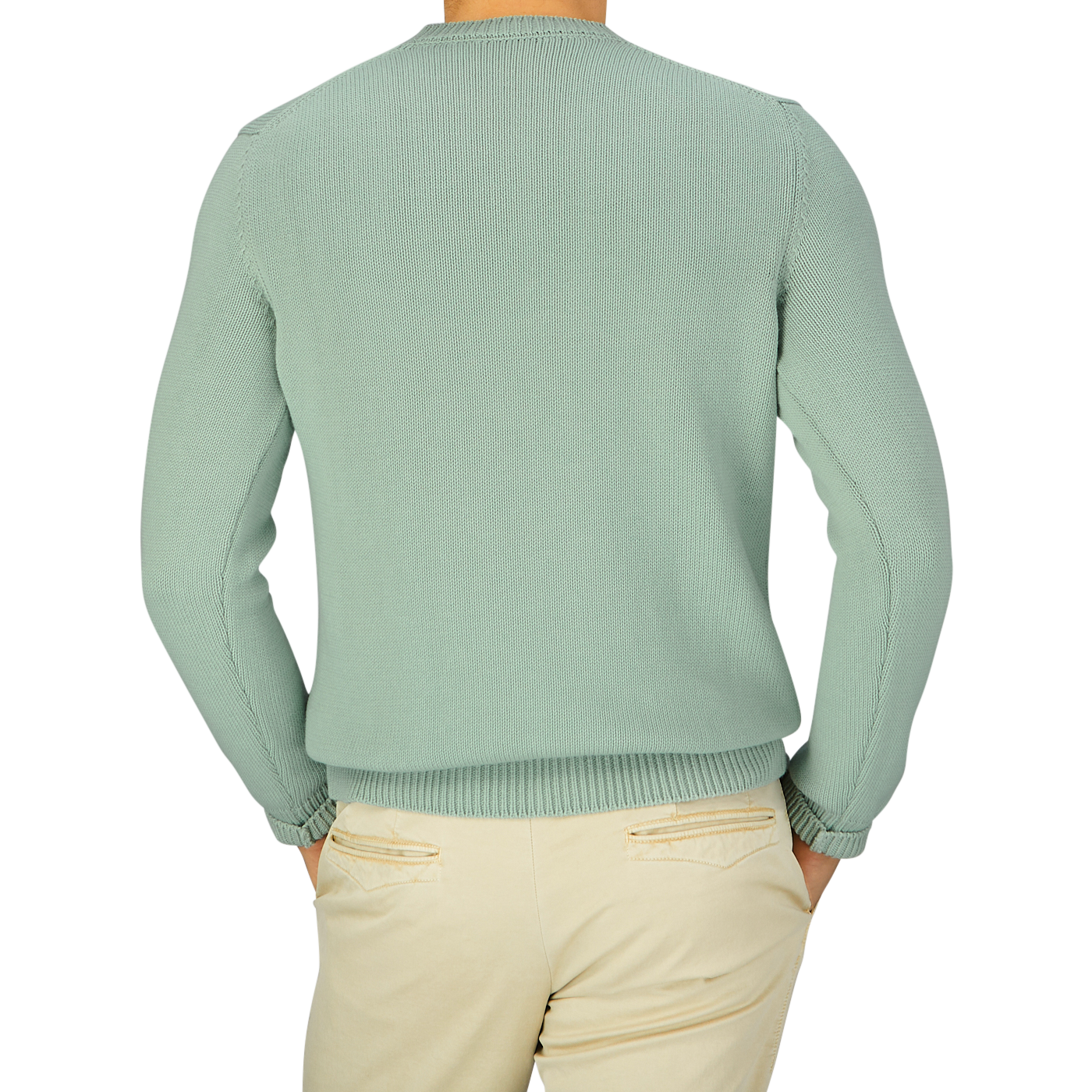 The back view of a man wearing a Zanone Aqua Green Cotton Crew Neck Sweater and khaki pants.