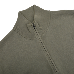 The Zanone Olive Green Crepe Cotton 1/4 Zip Sweater, featuring a stylish high collar, lies flat against the white background.