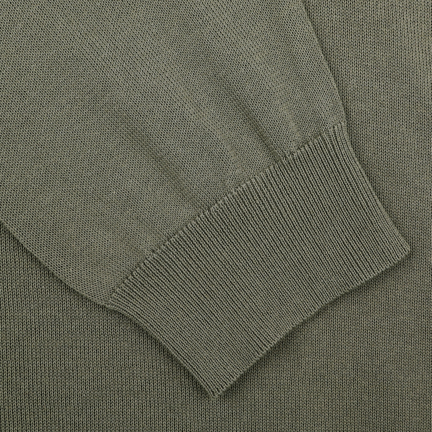 Close-up of an Olive Green Crepe Cotton 1/4 Zip Sweater by Zanone, highlighting the textured sleeve cuff and body.