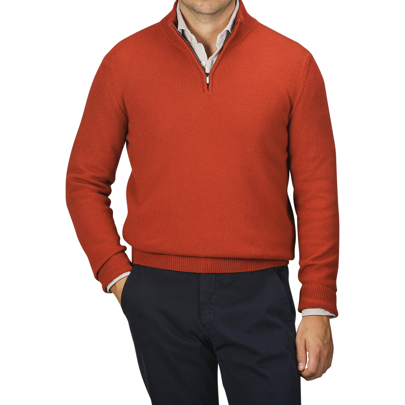 A man wearing a Zanone Rust Red Wool Quarter Zip Sweater over a white shirt and navy trousers with one hand in his pocket.