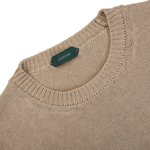 The back of a Taupe Beige Cotton Crew Neck Zanone sweater with a green label.
