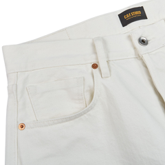 The back pocket of a white pair of Ecru Stone Washed Kuroki Cotton M7 Jeans by C.O.F Studio.