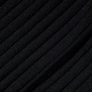 A close up view of black Canali Ribbed Cotton Socks in hosiery.