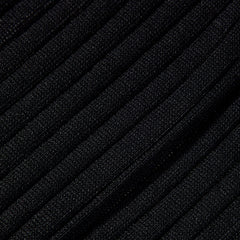 A close up view of black Canali Ribbed Cotton Socks in hosiery.