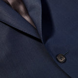 A close up image of the Canali Blue Wool Hopsack Travel Blazer featuring natural stretch.