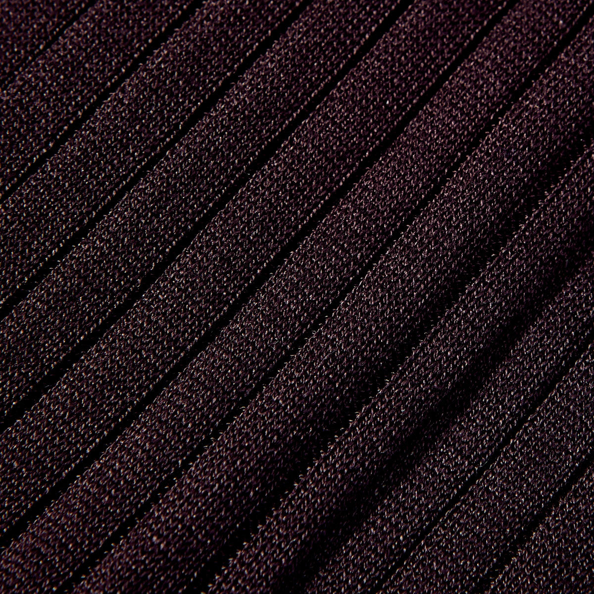 A close up image of a purple knit fabric suitable for Canali Egyptian cotton socks.