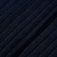 A close up image of Canali navy ribbed cotton socks made from dark blue Egyptian cotton fabric.