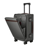 An image of a Carl Friedrik Polycarbonate Chocolate Leather Carry-on Pro suitcase on wheels with a laptop compartment.