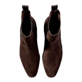 A pair of Dark Brown Suede Carmina Simpson Chelsea Boots on a white background.