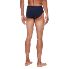 The back view of a man wearing Derek Rose Navy Pima Cotton Stretch Mid Briefs.