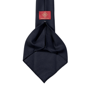 A Dreaming Of Monday Navy Blue 7-Fold Wool Hopsack tie.