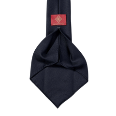 A Dreaming Of Monday Navy Blue 7-Fold Wool Hopsack tie.