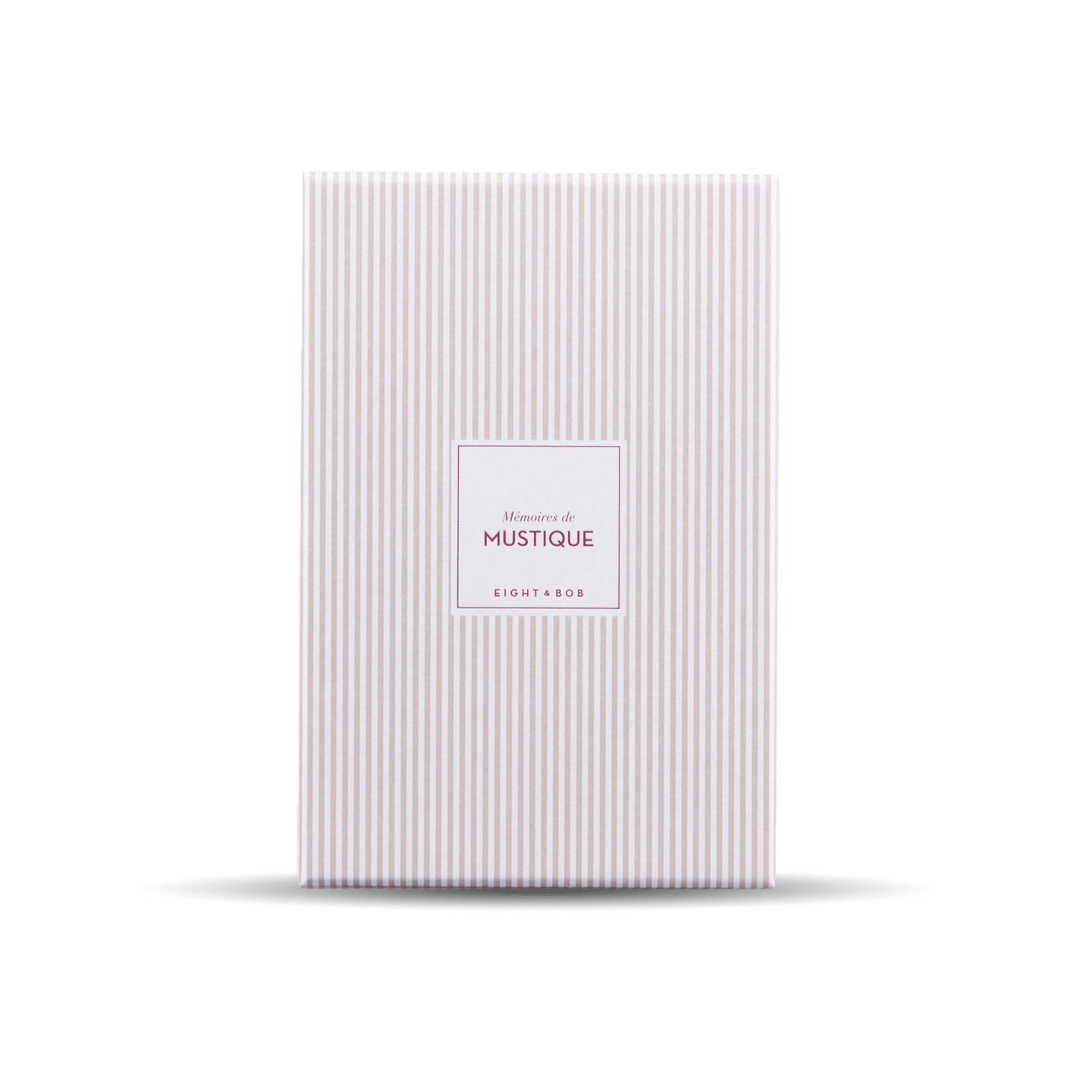 A white and pink striped Eight Bob Perfume Memories de Mustique 100 ml notebook.