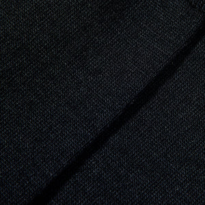 A close up image of a black Falke Airport Wool Cotton Socks sweater.