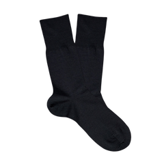 A pair of Falke black Airport Wool Cotton Socks on a white background.