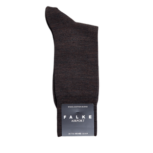 A pair of temperature-regulating, Brown Melange Airport Wool Cotton socks with the word "Falke" on them.