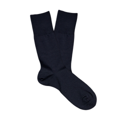 A pair of Navy Airport Wool Cotton Socks by Falke for temperature regulation on a white background.