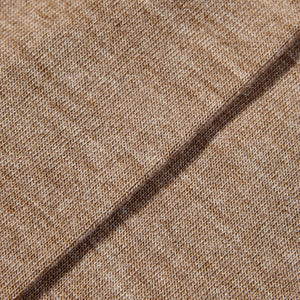 A close up image of Falke Nutmeg Airport Wool Cotton Socks, a premium merino wool knitted fabric.