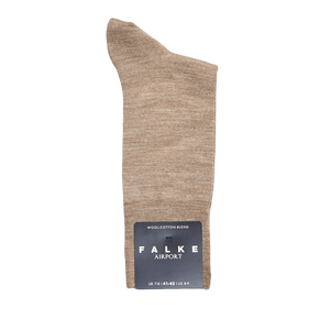 A pair of Falke Nutmeg Airport Wool Cotton Socks with the word pace on them, made of merino wool for temperature regulation.