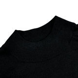 A close up of a black Fedeli Black 140s Wool Mockneck Sweater.