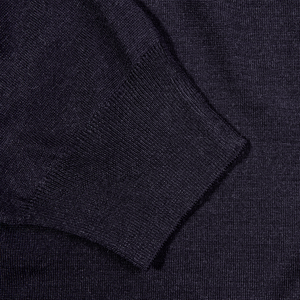 A close up of a chunkier Fedeli Navy 140s Wool Mockneck Sweater.