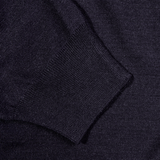 A close up of a chunkier Fedeli Navy 140s Wool Mockneck Sweater.