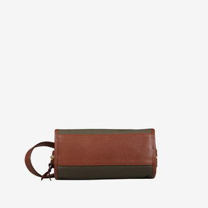 A small Green Canvas Chestnut Leather Small Travel Kit with a water-resistant lining by Frank Clegg.