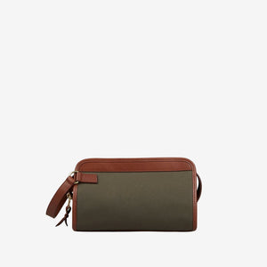 A Frank Clegg Green Canvas Chestnut Leather Small Travel Kit cross body bag.