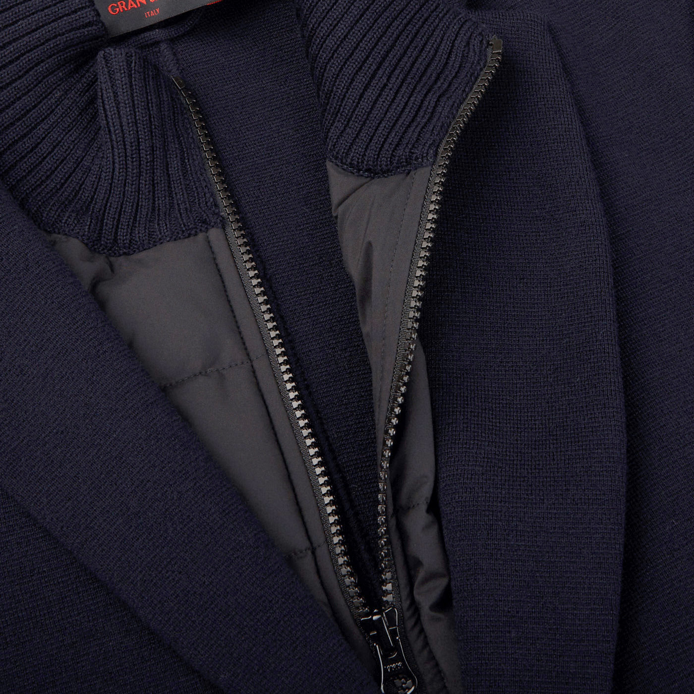 A close up of a Gran Sasso Navy Blue Rain Wool Knitted Jacket with a zipper.