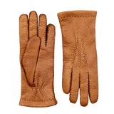 Hestra Cork Peccary Handsewn Cashmere Gloves on a grey surface.