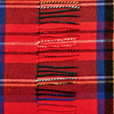 A close-up of a Johnstons of Elgin Red Checked Royal Stewart Cashmere Scarf.