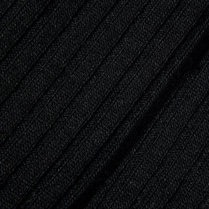 A close up image of Pantherella Black Merino Wool Ribbed Ankle Socks.