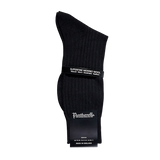 A pair of Pantherella Black Merino Wool Ribbed Ankle Socks on a white background, perfect for your sock drawer.