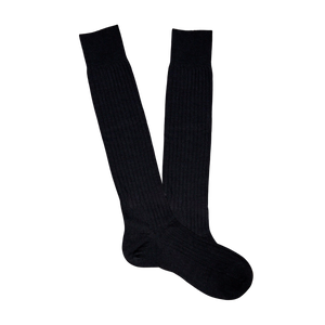 A pair of Black Merino Wool Ribbed Knee Socks by Pantherella on a white background.
