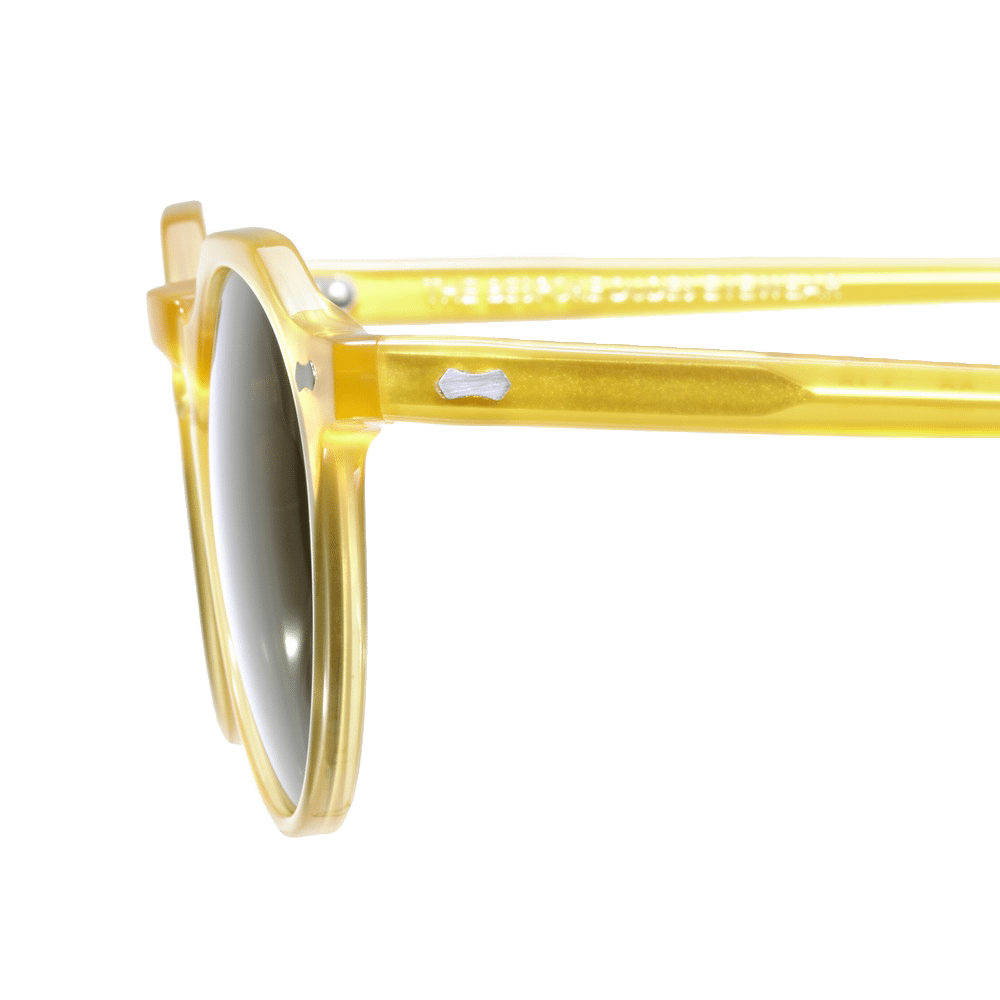 A pair of comfortably fitting Lapel Honey Frame sunglasses by The Bespoke Dudes on a white background.