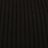 A close up of William Lockie's Black Cashmere Ribbed Short Beanie, Scotland's finest solid black ribbed beanie.